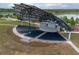 Amphitheater with a unique architectural design providing covered seating near the lake at 484 Lanarkshire Pl, Apopka, FL 32712