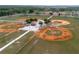 Aerial view of the baseball fields with well-maintained surfaces and lush green grass at 484 Lanarkshire Pl, Apopka, FL 32712