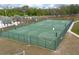 Multi-court basketball area is fully fenced for recreational activities at 484 Lanarkshire Pl, Apopka, FL 32712