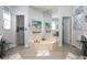 Bright bathroom with a large soaking tub, a vanity, and a separate shower area at 484 Lanarkshire Pl, Apopka, FL 32712