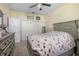 Comfortable bedroom features a large bed, dresser, and closet space at 484 Lanarkshire Pl, Apopka, FL 32712
