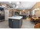 Kitchen island view of open living space with dining area at 484 Lanarkshire Pl, Apopka, FL 32712