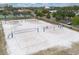 Sandy volleyball courts with blue lines are ready for some fun in the sun at 484 Lanarkshire Pl, Apopka, FL 32712