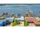 Stunning aerial view of waterfront home with private boat dock and beautiful bay views at 5 Talo Cir, Port Orange, FL 32127