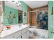Updated bathroom features stylish decor with a shower and tub combination and modern fixtures at 5 Talo Cir, Port Orange, FL 32127