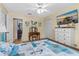 Bright bedroom with warm accents features modern decor, wood floors, and cozy coastal accents at 5 Talo Cir, Port Orange, FL 32127