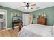 Relaxing bedroom with beach decor, and en-suite bathroom at 5 Talo Cir, Port Orange, FL 32127