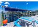 Boat dock showcasing an adjacent picnic table for outdoor relaxation and dining by the water at 5 Talo Cir, Port Orange, FL 32127