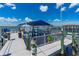 View of boat dock with multiple boat lifts for easy water access at 5 Talo Cir, Port Orange, FL 32127