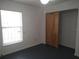 This bedroom boasts a closet and a window that brings natural light at 540 W Mathis Ave, Deland, FL 32720