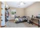 Bedroom with carpet, natural light from the window, a built in wardrobe, and a study desk at 5410 Deleon Springs Ranch Rd, De Leon Springs, FL 32130