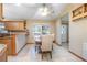 Charming dining room with a view of the kitchen and natural light at 5410 Deleon Springs Ranch Rd, De Leon Springs, FL 32130