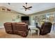 Comfortable living room featuring sliding glass doors that bring in natural light and provide nice view at 5479 Saint Regis Way, Port Orange, FL 32128