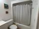 Clean bathroom featuring a shower-tub combination and white fixtures, providing a functional and well-maintained space at 5500 Ocean Shore Blvd # Ut18, Ormond Beach, FL 32176