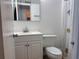 Bathroom with a white vanity and a shower with a fun fish patterned shower curtain at 5500 Ocean Shore Blvd # Ut18, Ormond Beach, FL 32176