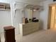 Bedroom with a dresser, and closet with shelving for storage at 5500 Ocean Shore Blvd # Ut18, Ormond Beach, FL 32176