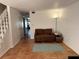 Inviting living area with tile floors, neutral walls, and a comfortable sofa; ideal for entertaining at 5500 Ocean Shore Blvd # Ut18, Ormond Beach, FL 32176