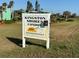 Kingston Shores Condos sign on a sunny day in a grassy area at 5500 Ocean Shore Blvd # Ut18, Ormond Beach, FL 32176