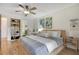 Bright bedroom with a ceiling fan, and a desk, offering comfort and functionality at 563 Belltower Ave # 240, Deltona, FL 32725