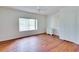 Bedroom with hardwood floors, a large window and natural light at 607 Herbert St, Port Orange, FL 32129