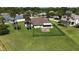 Well-maintained home with fenced yard, screened porch, and fire pit for outdoor enjoyment at 6182 Knotty Pine Ct, Port Orange, FL 32127