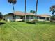 Exterior of home featuring a screened porch with a fenced in backyard at 6182 Knotty Pine Ct, Port Orange, FL 32127