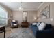 Cozy living room with neutral walls, stylish decor, and comfortable seating at 6194 Half Moon Dr, Port Orange, FL 32127