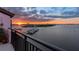 Scenic balcony view featuring a stunning sunset over the marina and waterfront at 761 Marina Point Dr # 7610, Daytona Beach, FL 32114