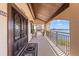 Inviting balcony with a patterned rug, and a view of the river at 761 Marina Point Dr # 7610, Daytona Beach, FL 32114