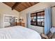 This light and bright bedroom features a spacious closet and water views at 761 Marina Point Dr # 7610, Daytona Beach, FL 32114