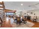 Spacious dining room with hardwood floors, contemporary furnishings, and stunning water views at 761 Marina Point Dr # 7610, Daytona Beach, FL 32114