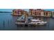 Waterfront condos featuring docks, boats, and beautiful waterfront views at sunset at 761 Marina Point Dr # 7610, Daytona Beach, FL 32114