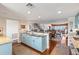 Spacious kitchen with stainless appliances, seating, and an open-concept design at 761 Marina Point Dr # 7610, Daytona Beach, FL 32114