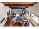 A living room featuring hardwood floors, a large area rug and water views at 761 Marina Point Dr # 7610, Daytona Beach, FL 32114