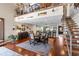 Bright living space with dining area and loft, showcasing an open layout at 761 Marina Point Dr # 7610, Daytona Beach, FL 32114