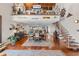 Open living space with hardwood floors connects dining, kitchen, and loft areas of the home at 761 Marina Point Dr # 7610, Daytona Beach, FL 32114