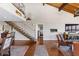 Open-concept living area with staircase leading to upper level at 761 Marina Point Dr # 7610, Daytona Beach, FL 32114