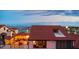 Inviting rooftop dining area with stylish furniture, perfect for outdoor gatherings and relaxation with water views at 761 Marina Point Dr # 7610, Daytona Beach, FL 32114