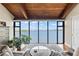 Relaxing sitting area with panoramic water views and lots of natural light at 761 Marina Point Dr # 7610, Daytona Beach, FL 32114