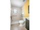 Bathroom with tiled walk-in shower and grab bars at 816 W Franklin Ave, Deland, FL 32720