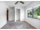 Bedroom features a large window, closet and neutral walls at 816 W Franklin Ave, Deland, FL 32720