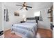 A comfortable bedroom with a ceiling fan offers a peaceful retreat at 82 Margaret Rd, Ormond Beach, FL 32176