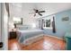 A cozy bedroom offers a relaxing retreat with ample natural light at 82 Margaret Rd, Ormond Beach, FL 32176