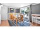 Inviting dining area with sliding glass doors leading to outdoor patio at 82 Margaret Rd, Ormond Beach, FL 32176