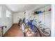 Spacious garage area with bikes and storage shelves, ready for all your beach gear at 82 Margaret Rd, Ormond Beach, FL 32176