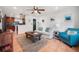 Open concept living room featuring comfortable seating and seamless flow to kitchen at 82 Margaret Rd, Ormond Beach, FL 32176