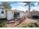 Cozy brick patio with outdoor seating, perfect for enjoying the beautiful backyard at 82 Margaret Rd, Ormond Beach, FL 32176