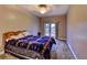Bedroom with carpet flooring and exterior access at 910 N Kepler Rd, Deland, FL 32724