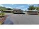 Well-maintained property features a detached garage and ample parking space at 910 N Kepler Rd, Deland, FL 32724
