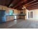 Kitchen with stainless steel appliances, light wood cabinets, and a view at 910 N Kepler Rd, Deland, FL 32724